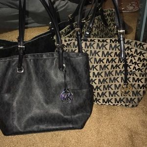 Two Michael Kors Jet large Tote bags